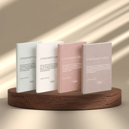 presentation de collection des cahiers personnalise l'indomptable en 4 couleurs