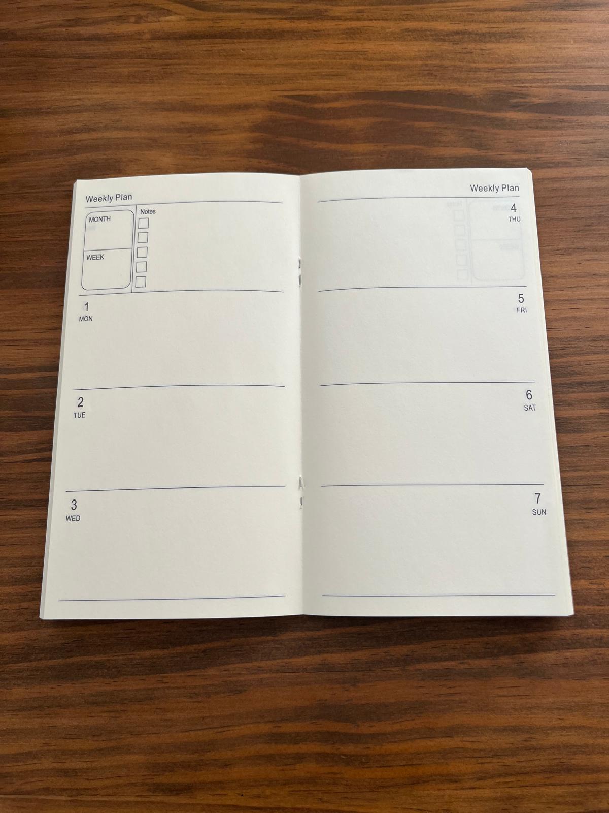 Double page du semainier non daté : une semaine du lundi au dimanche